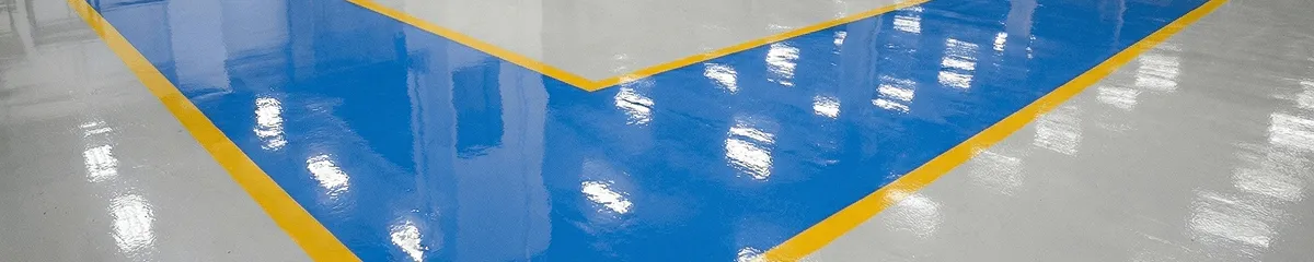 A factory floor professionally covered and marked with epoxy flooring in Myrtle Beach, SC