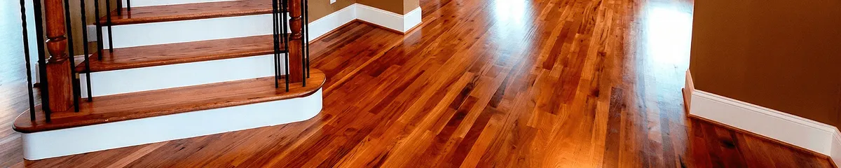 Base floor of a staircase with professionally restored wood flooring in Myrtle Beach SC