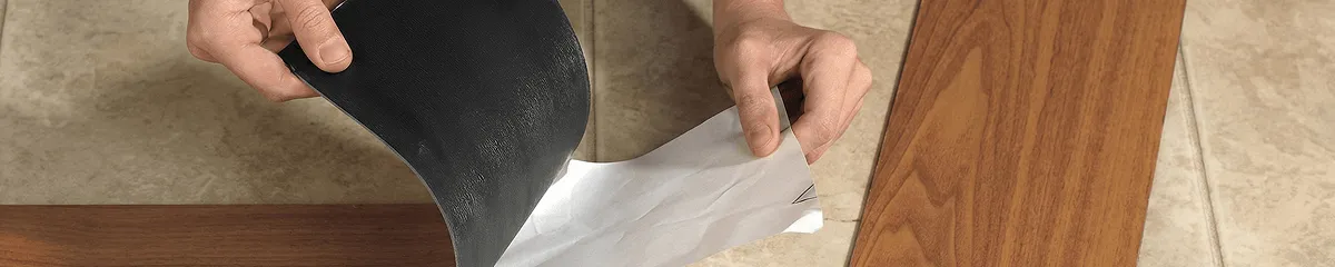 A professional installing vinyl flooring in Myrtle Beach, SC