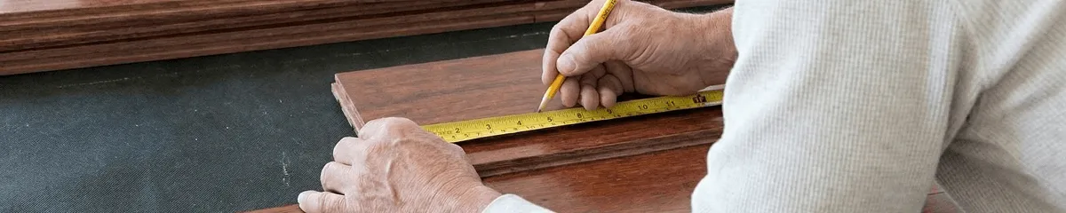 A professional installing wood flooring in Myrtle Beach, SC